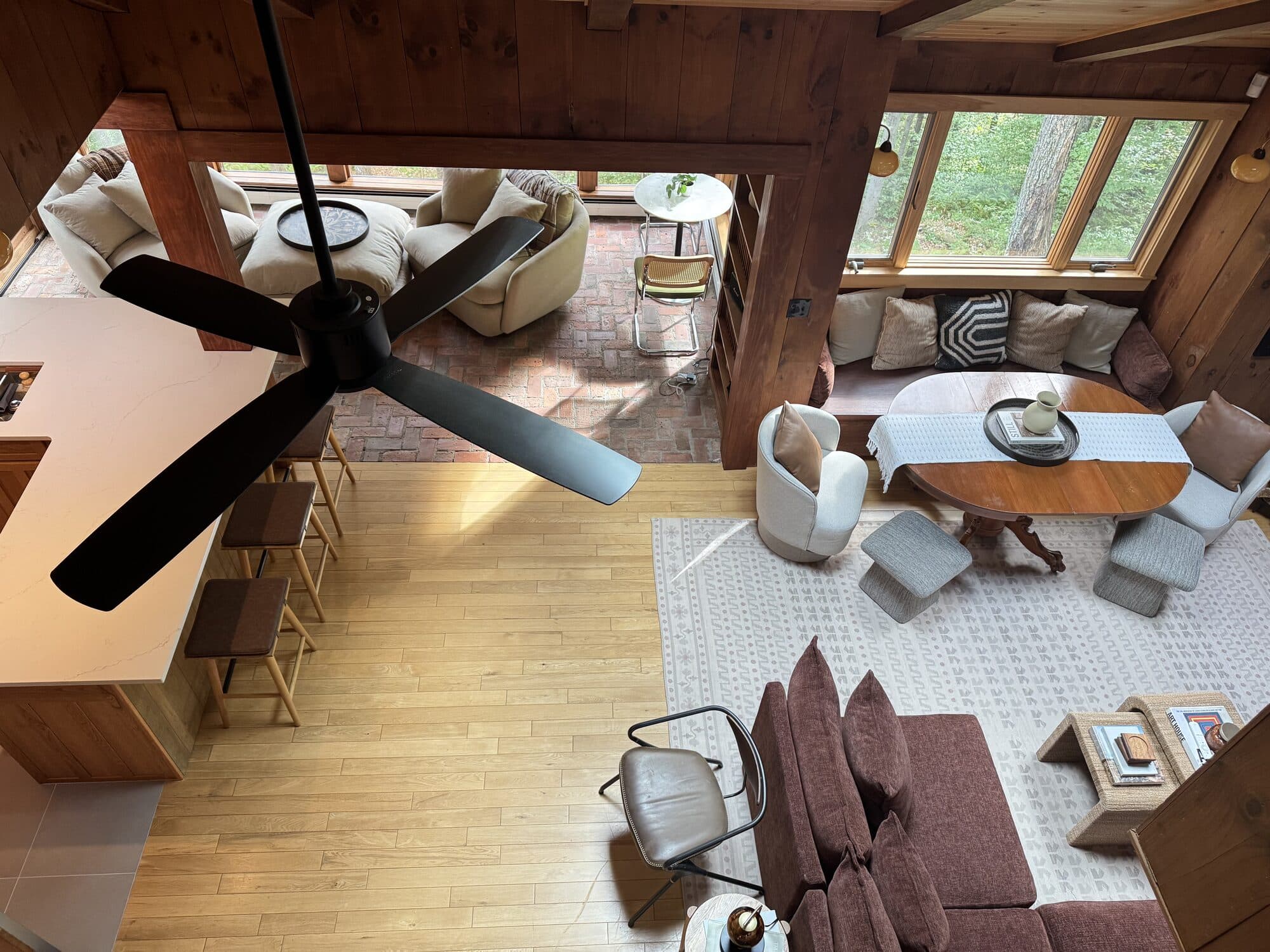 Overhead view of a guest-ready living, dining, and kitchen space in a Vermont rental